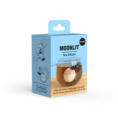 Moonlit tea infuser packaging with a blue background and tea cup illustration.